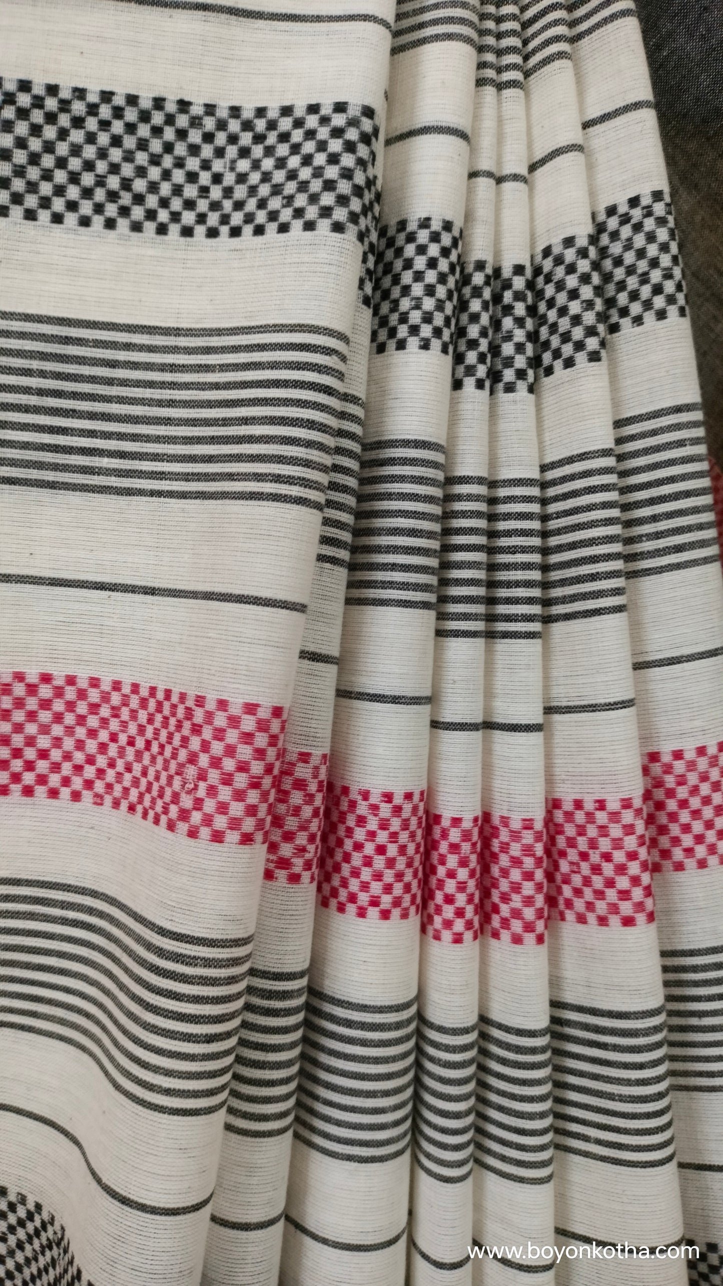 Eternal Contrast – White Dhonekhali Handloom Cotton Saree with Red and Black Woven Stripes