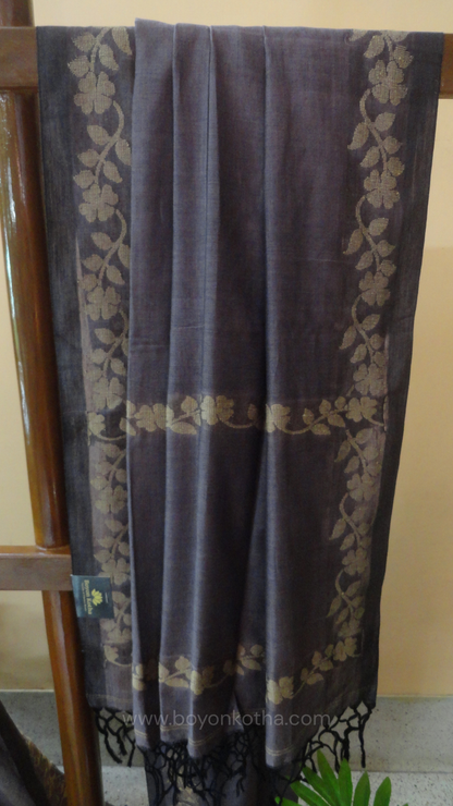 Steel gray handloom cotton saree with woven beige floral vines running on both sides of the border till he pallu, bengal handloom, gray cotton saree