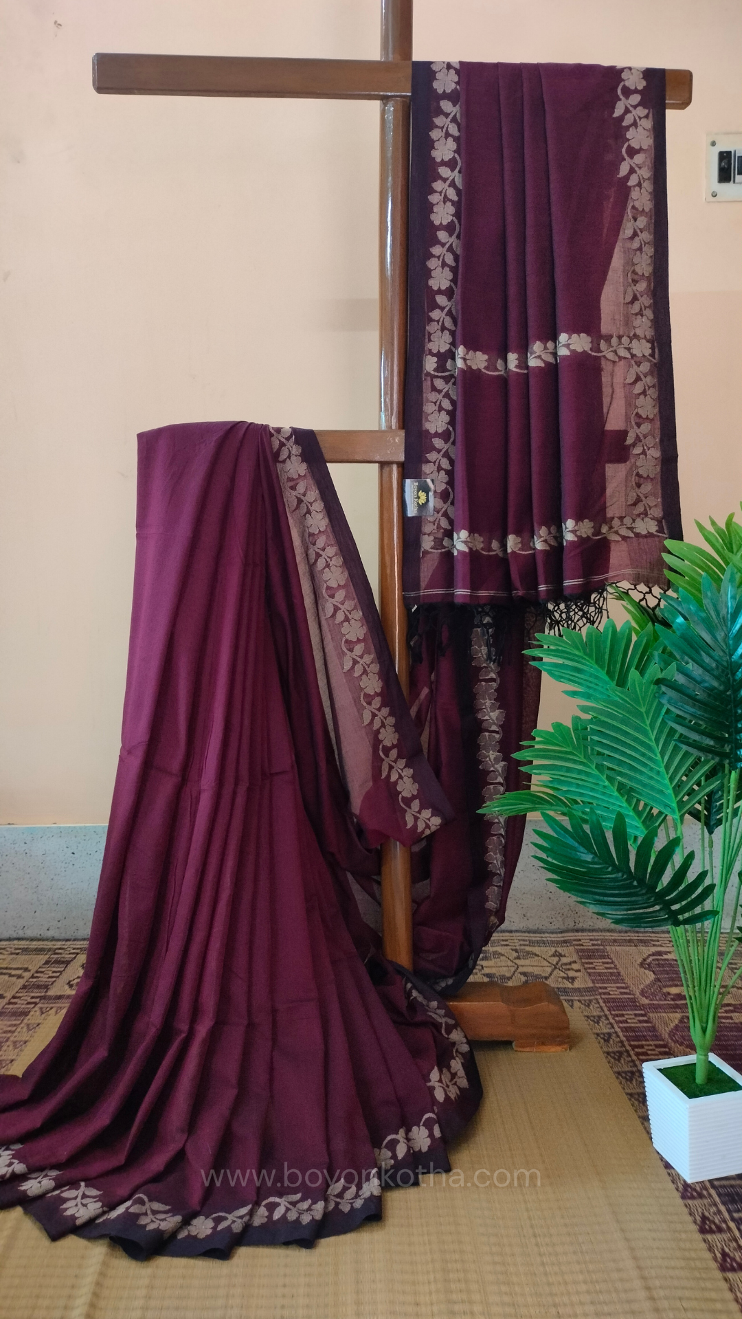 Handloom cotton saree, maroon color with beige floral vines in the border and pallu