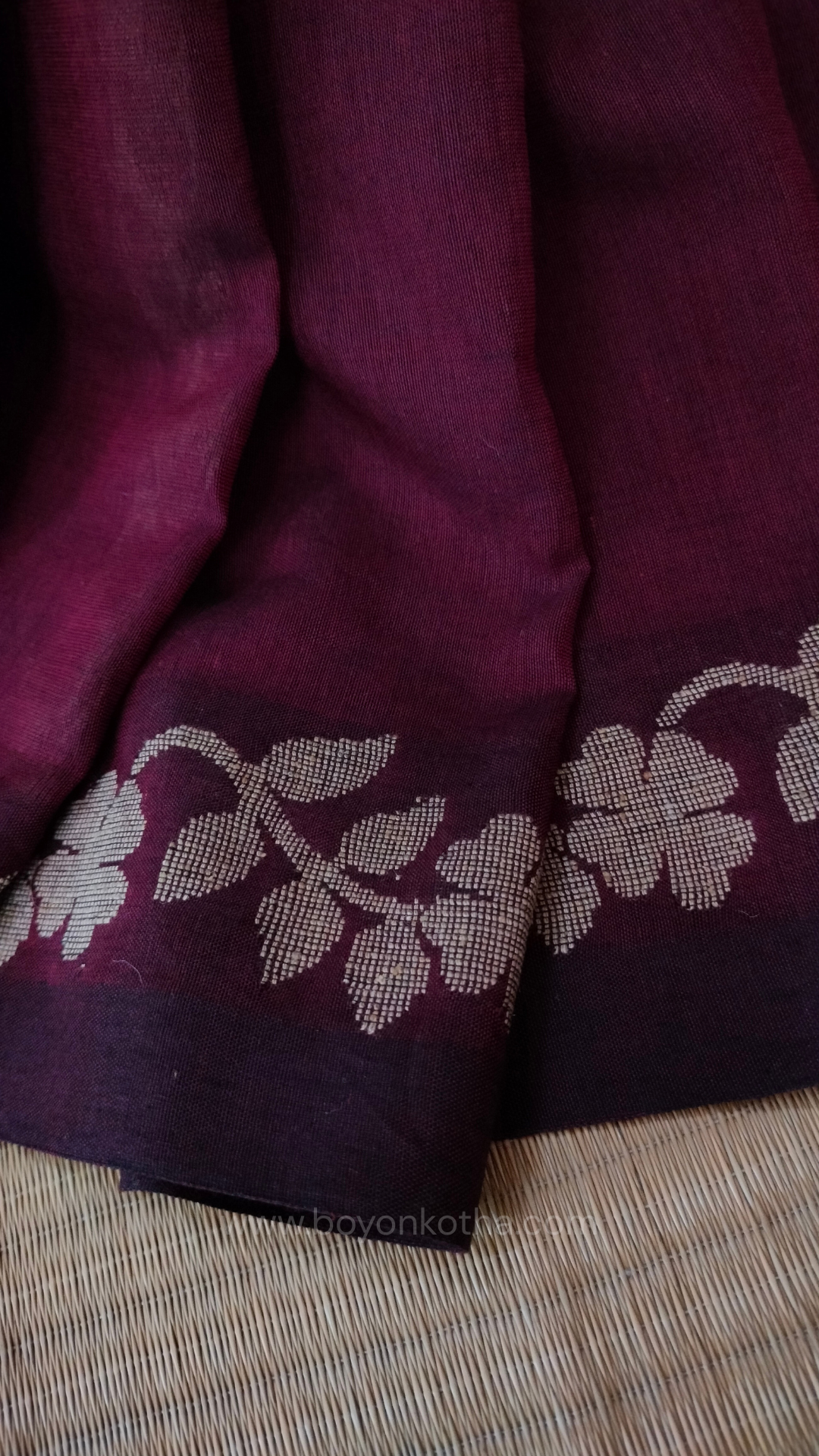 Handloom cotton saree, maroon color with beige floral vines in the border and pallu