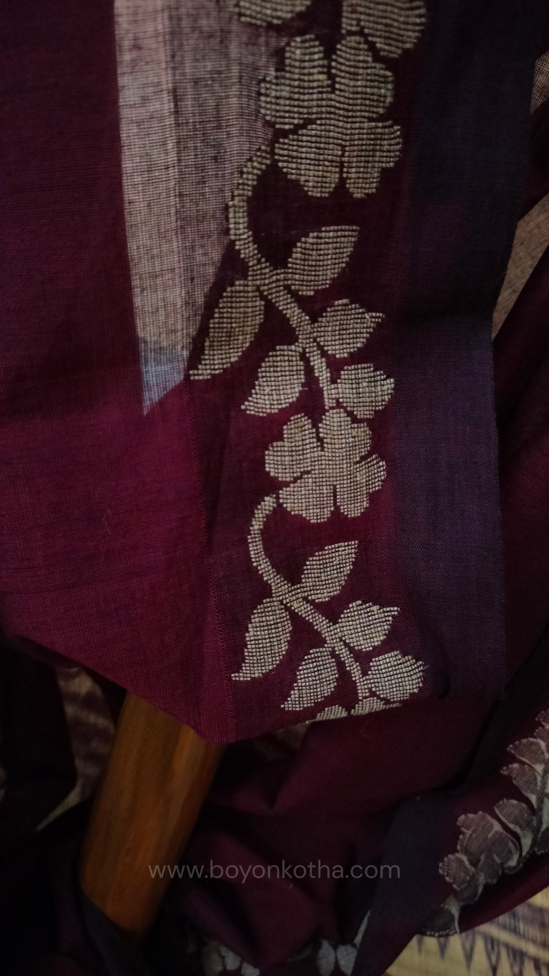 Handloom cotton saree, maroon color with beige floral vines in the border and pallu