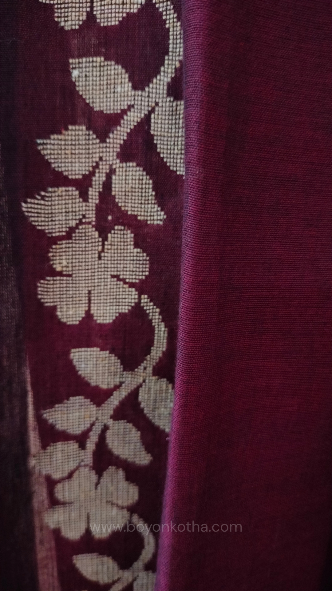 Handloom cotton saree, maroon color with beige floral vines in the border and pallu