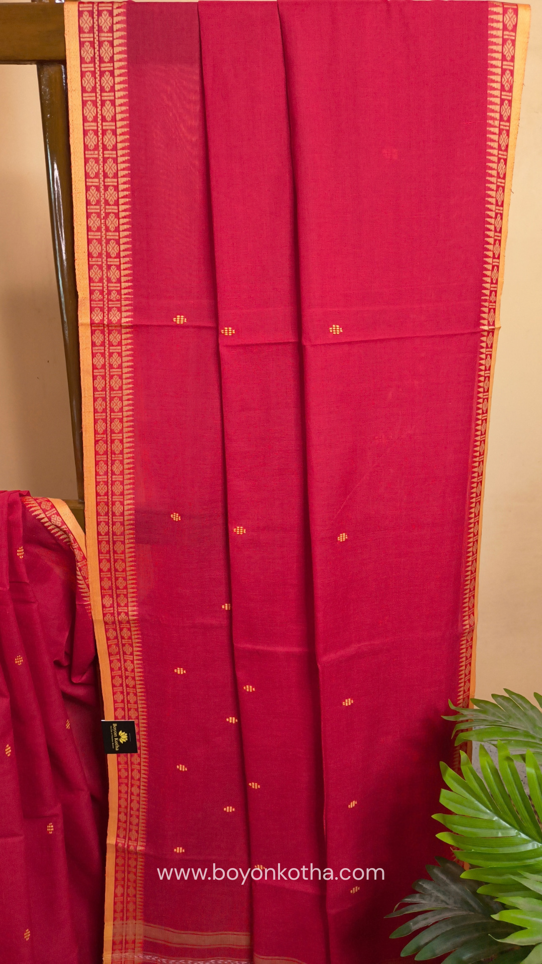 Tomato red Dhonekhali handloom cotton saree with beige border and butas in the saree, Ideal for office wear, casual gathering.