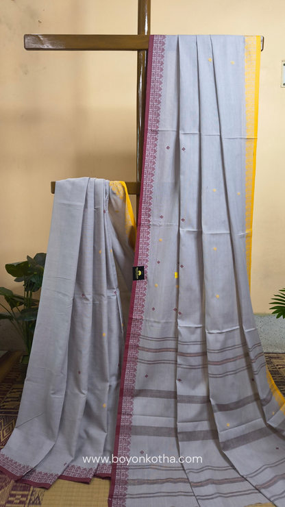Light grey Dhonekhali handloom cotton saree with maroon and yellow dual border and butas in the saree, Ideal for office wear, casual gathering.