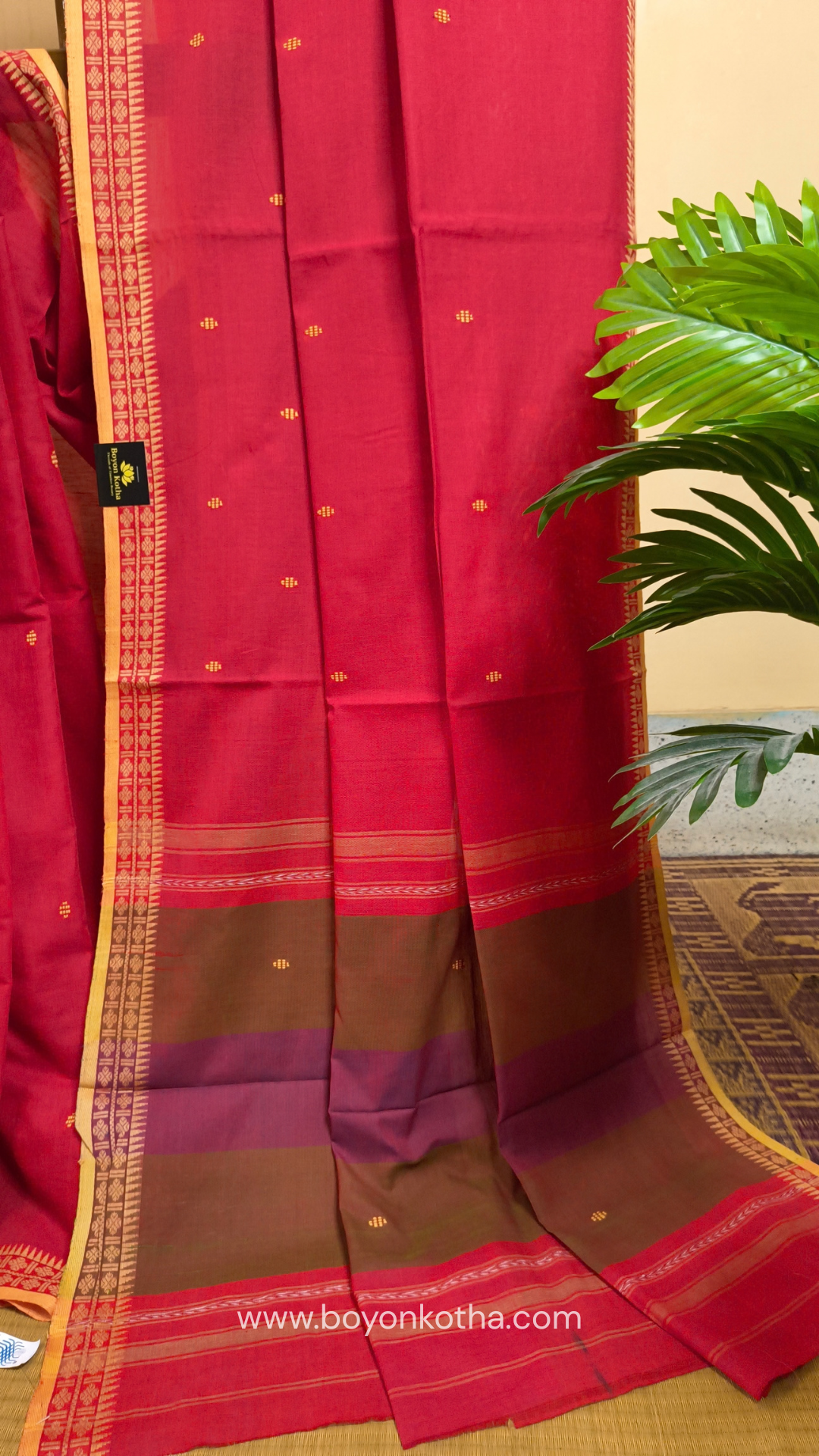 Tomato red Dhonekhali handloom cotton saree with beige border and butas in the saree, Ideal for office wear, casual gathering.