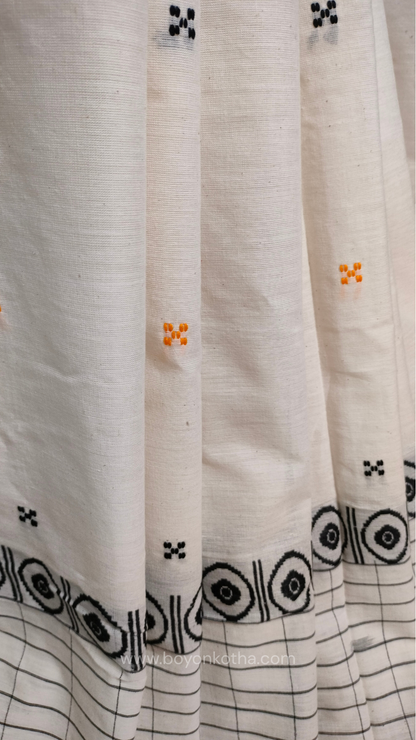White Dhonekhali handloom cotton saree featuring a delicate yellow border and intricate woven black and yellow motifs. 