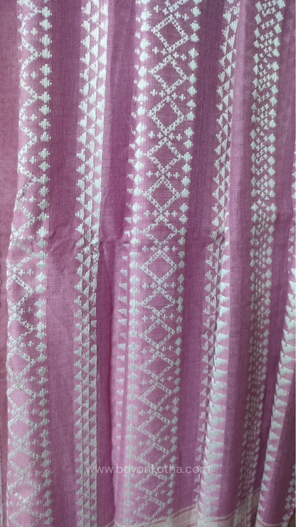 Pink Dhonekhali cotton saree adorned with delicate off-white woven patterns across the saree. Perfect for morning pujas to evening celebrations, for festive occasions
