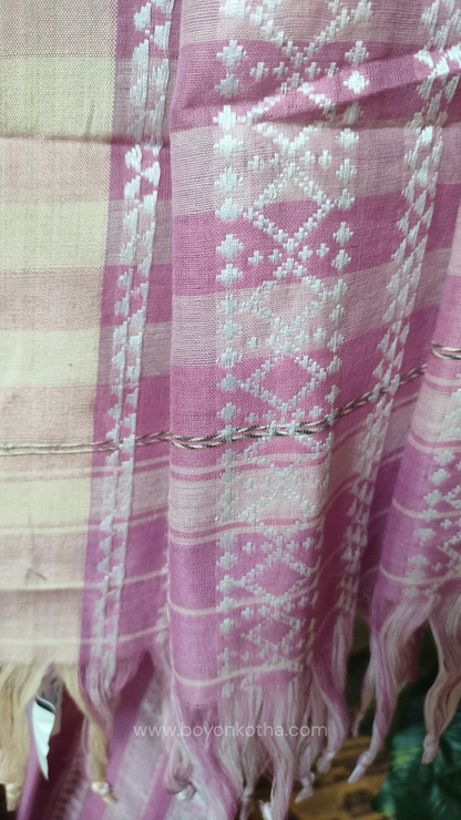 Pink Dhonekhali cotton saree adorned with delicate off-white woven patterns across the saree. Perfect for morning pujas to evening celebrations, for festive occasions