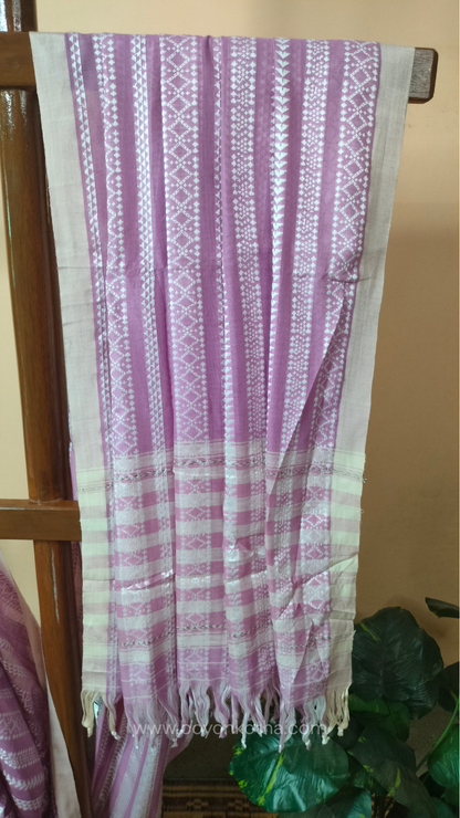 Pink Dhonekhali cotton saree adorned with delicate off-white woven patterns across the saree. Perfect for morning pujas to evening celebrations, for festive occasions