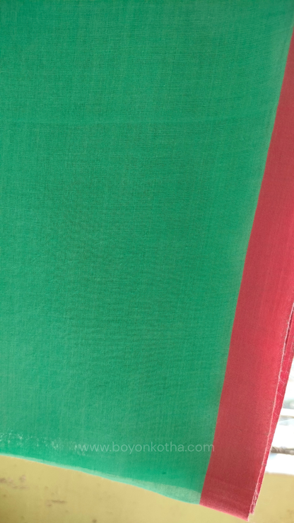 Mint green handwoven mul cotton saree with pink border, pallu ending in tassels. Plain handloom saree from Bengal.