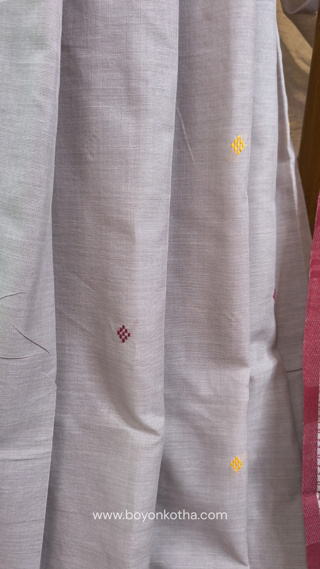 Light grey Dhonekhali handloom cotton saree with maroon and yellow dual border and butas in the saree, Ideal for office wear, casual gathering.