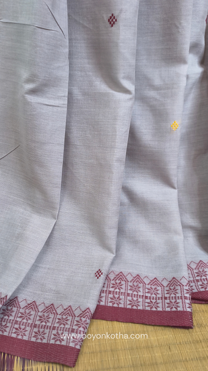 Light grey Dhonekhali handloom cotton saree with maroon and yellow dual border and butas in the saree, Ideal for office wear, casual gathering.