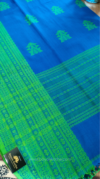 Royal blue handwoven mercerized cotton saree with Manipuri-inspired thread work pattern in green. Durable, breathable Bengal handloom saree for festive wear.