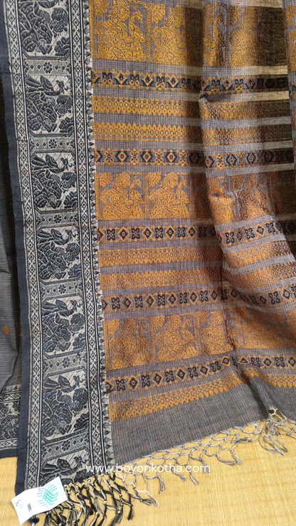 Grey cotton baluchari saree, with woven motifs in the border & pallu in black and copper. Bengal handloom ideal for festivals & everyday celebrations.