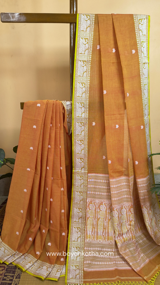Dark orange cotton baluchari saree, with woven motifs in the border & pallu in white and neon green. Bengal handloom ideal for festivals & everyday celebrations.