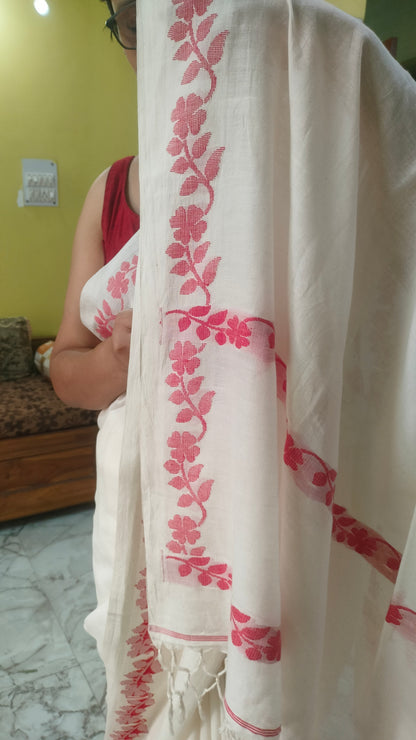 White handloom cotton saree with woven red floral vines along the border running till the pallu - Bengal handloom