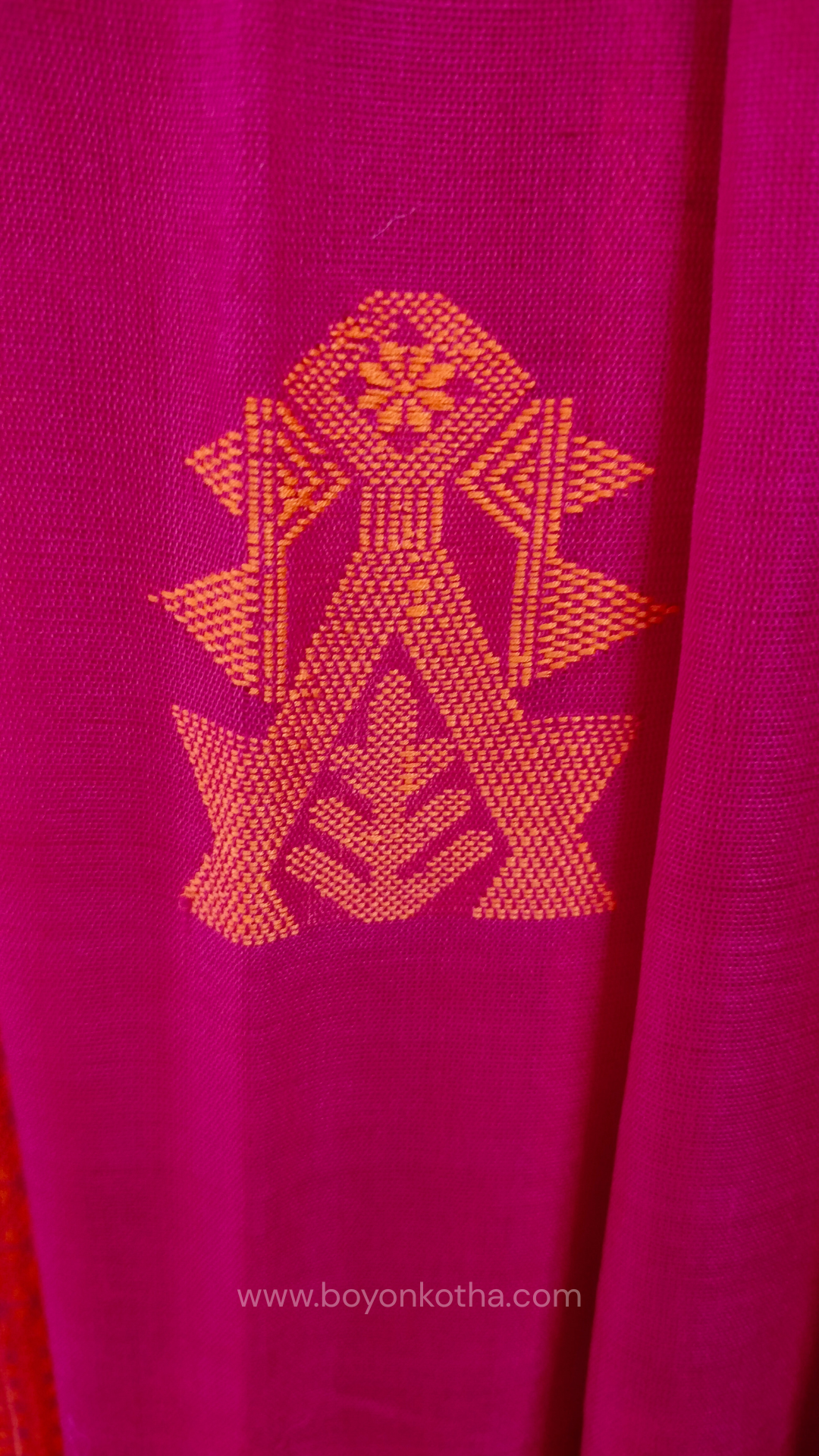 Rani Pink handwoven mercerized cotton saree with Manipuri-inspired thread work pattern in orange. Durable, breathable Bengal handloom saree for festive wear.