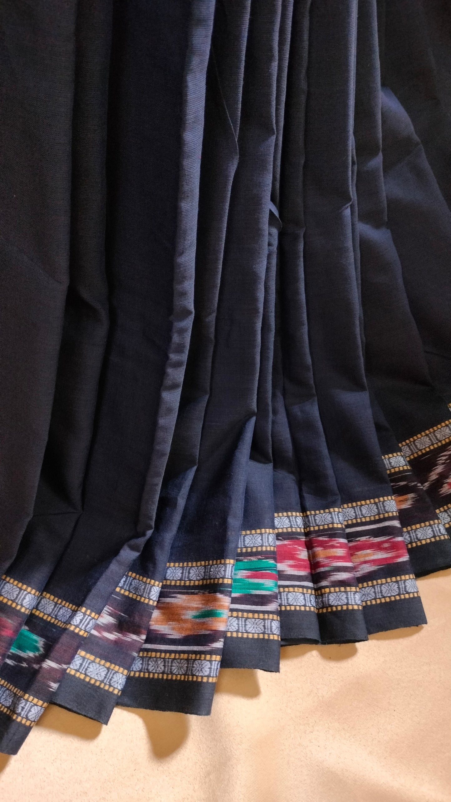 Neeloborno - Navy Blue Dhonekhali Handloom Cotton Saree with Ikat-style Border