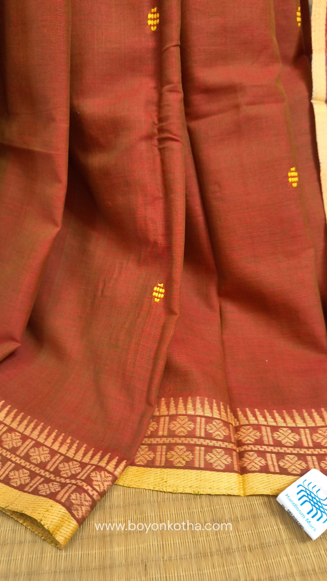 Rust Dhonekhali handloom cotton saree with red & blue stripes in the pallu and beige woven thin border; Ideal for office wear, casual gathering.
