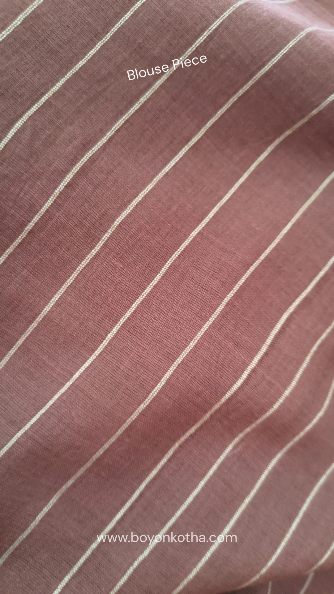 Mauvish Brown buttery soft handloom cotton saree, with jamdani inspired handloom jacquard woven butas all over and braided tassels. Ideal for festive mornings 