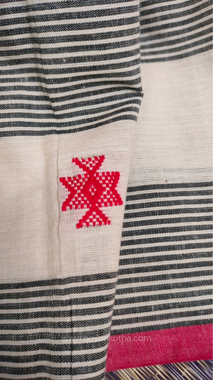 Elegant off-white Dhonekhali handloom cotton saree featuring striking black stripes and woven red and black motifs.