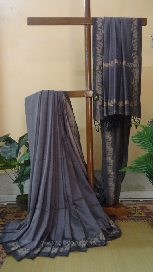 Steel gray handloom cotton saree with woven beige floral vines running on both sides of the border till he pallu, bengal handloom, gray cotton saree