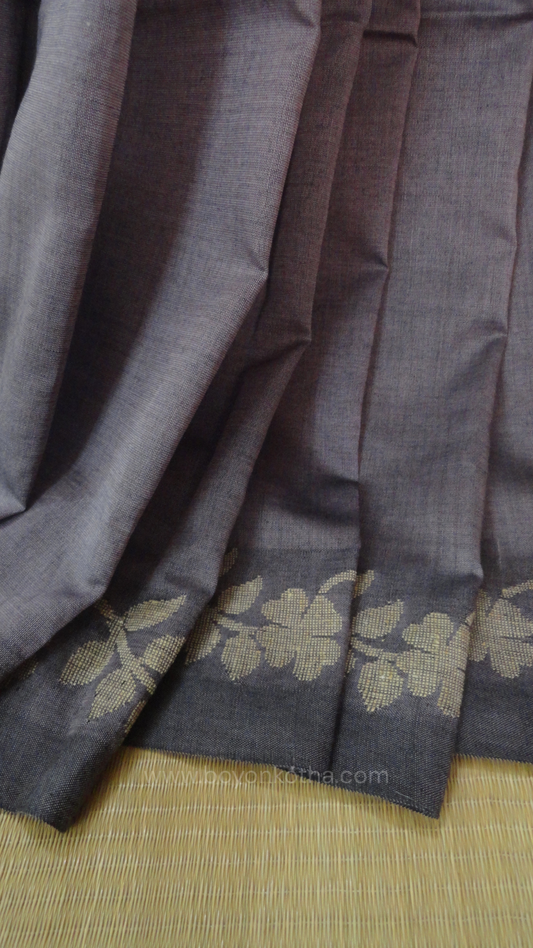 Steel gray handloom cotton saree with woven beige floral vines running on both sides of the border till he pallu, bengal handloom, gray cotton saree