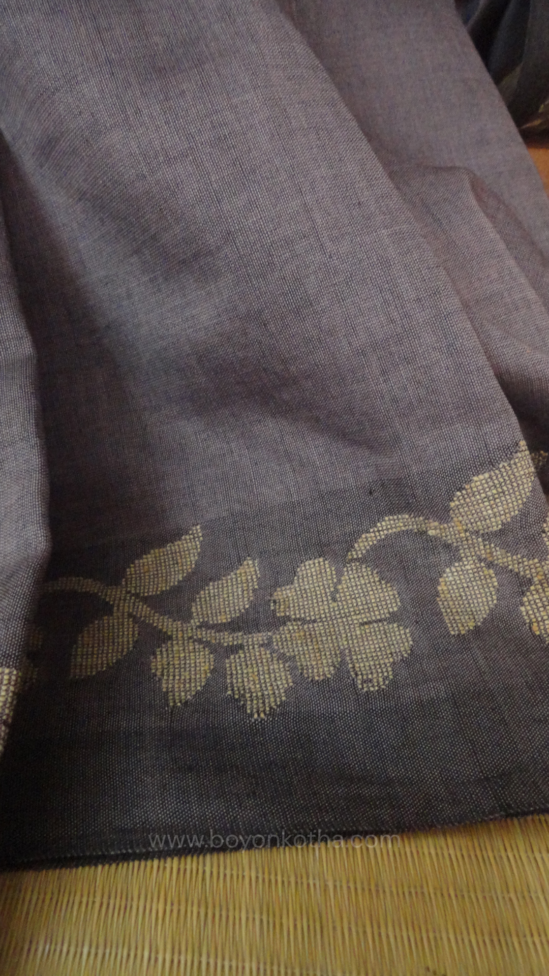 Steel gray handloom cotton saree with woven beige floral vines running on both sides of the border till he pallu, bengal handloom, gray cotton saree