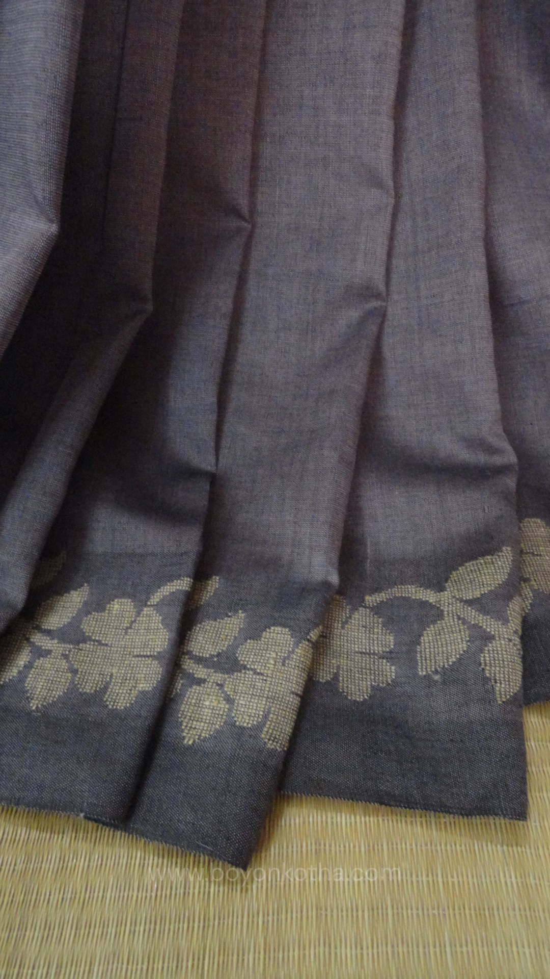 Steel gray handloom cotton saree with woven beige floral vines running on both sides of the border till he pallu, bengal handloom, gray cotton saree