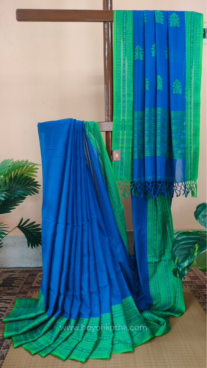 Royal blue handwoven mercerized cotton saree with Manipuri-inspired thread work pattern in green. Durable, breathable Bengal handloom saree for festive wear.