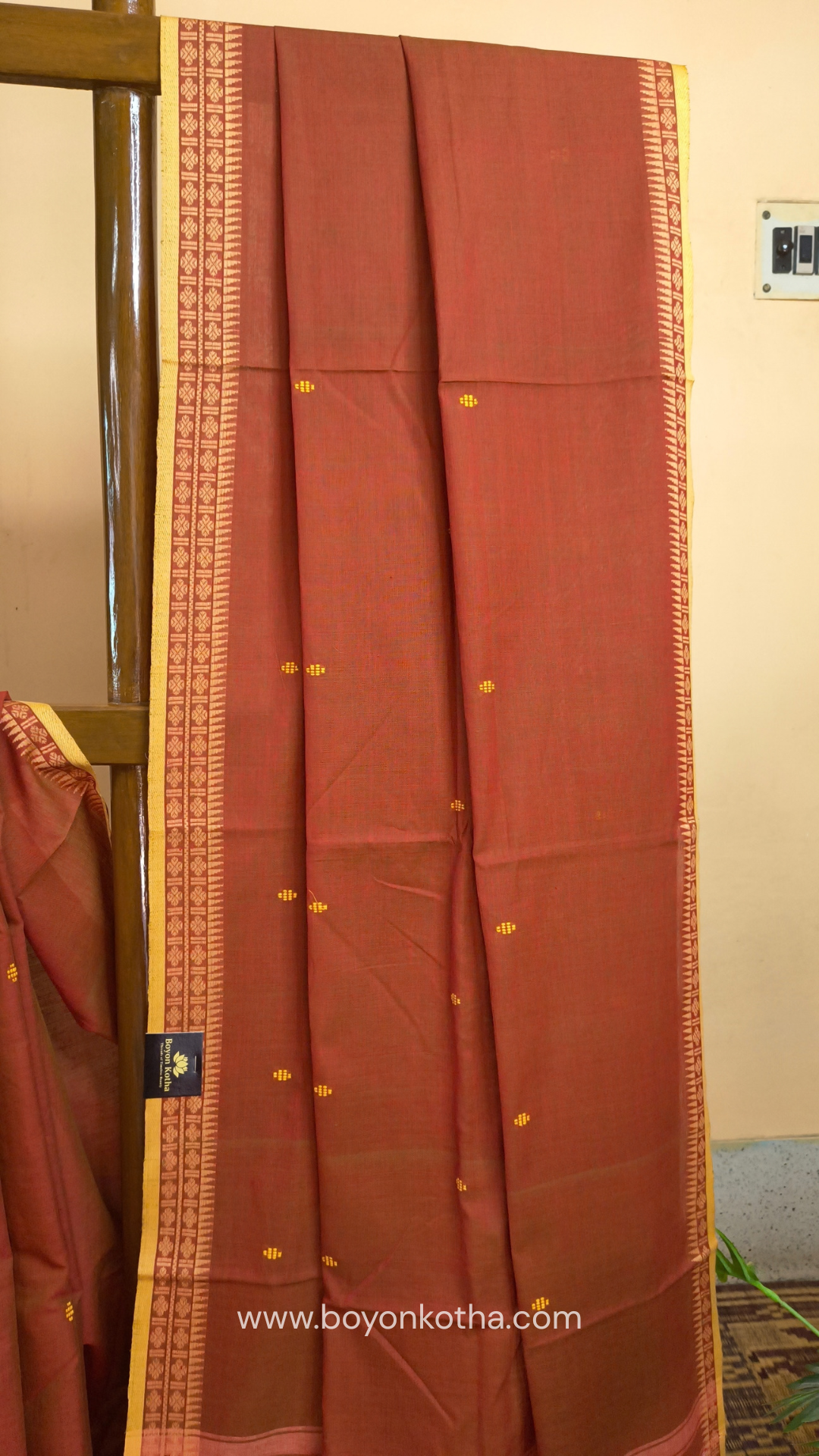 Rust Dhonekhali handloom cotton saree with red & blue stripes in the pallu and beige woven thin border; Ideal for office wear, casual gathering.