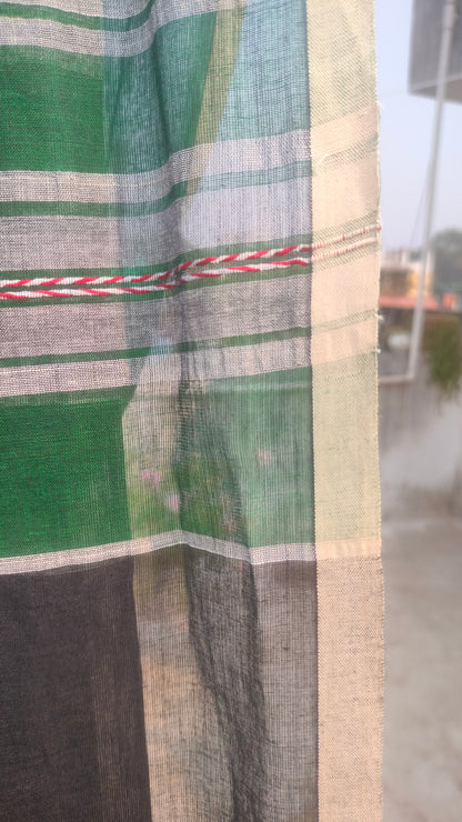 Green saree, handloom cotton, Dhonekhali weave, with red and white woven motifs across the saree