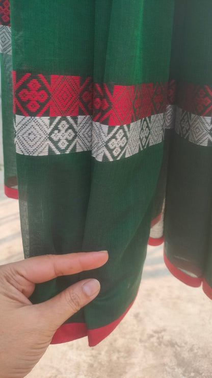 Green saree, handloom cotton, Dhonekhali weave, with red and white woven motifs across the saree