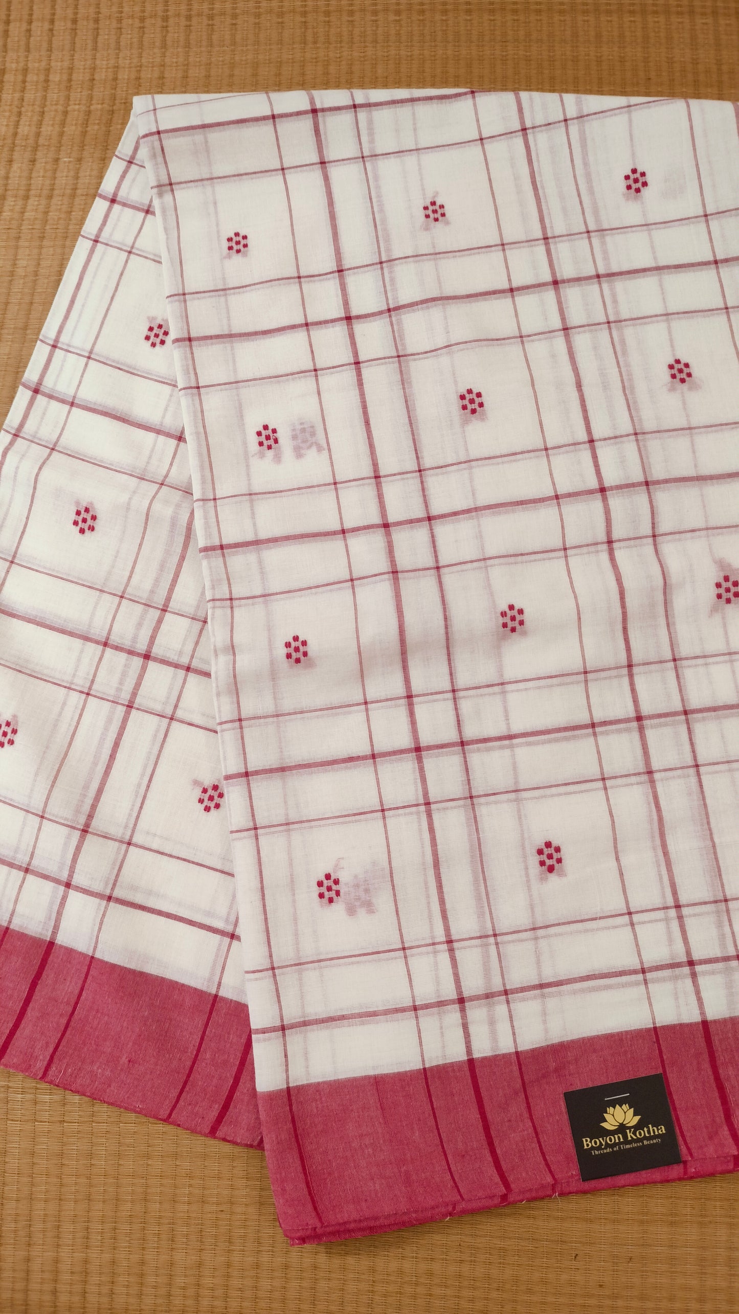 Red and white handloom cotton saree with woven checks and motifs. Dhonekhali cotton from Bengal handloom. 