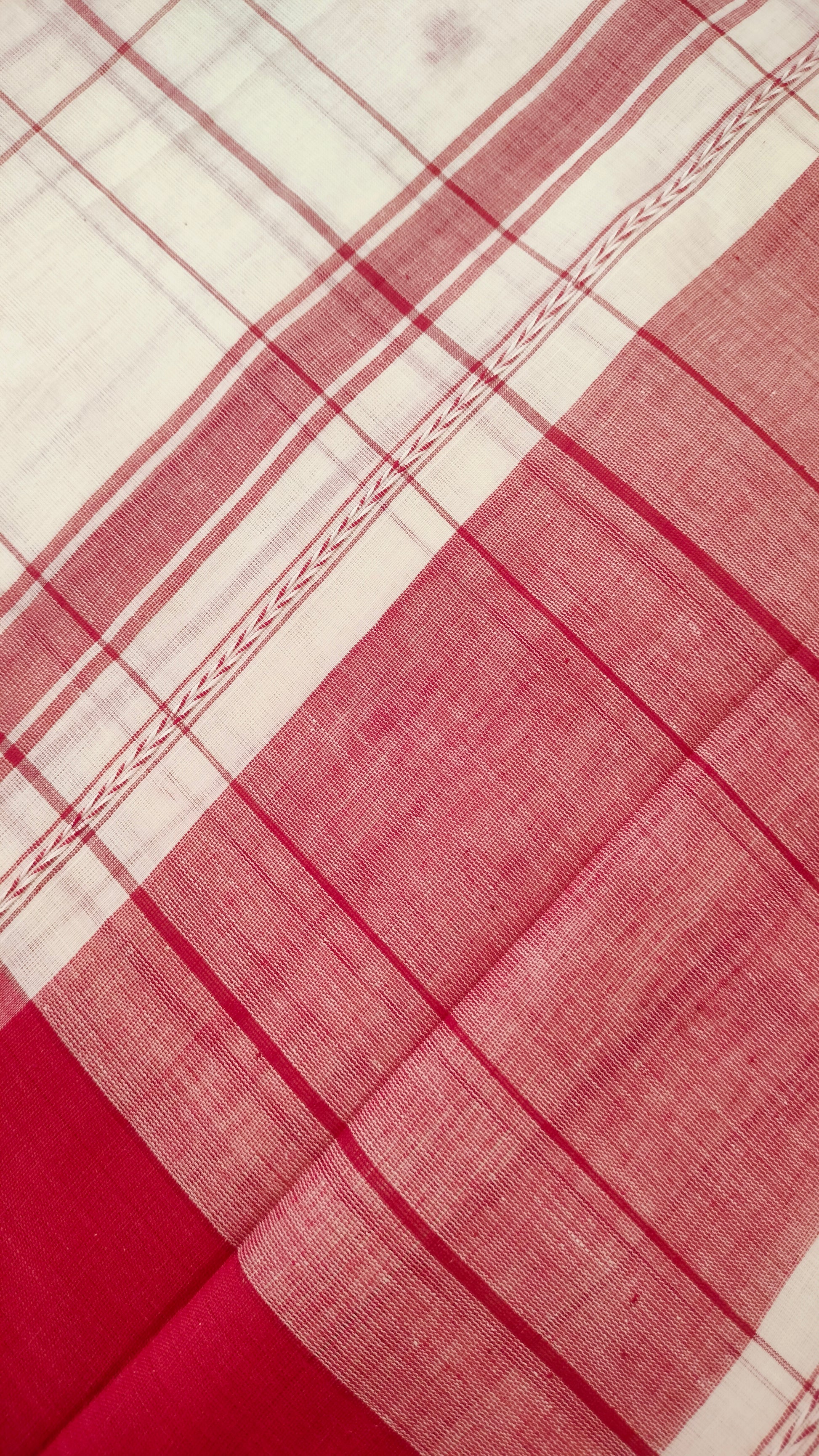 Red and white handloom cotton saree with woven checks and motifs. Dhonekhali cotton from Bengal handloom. 