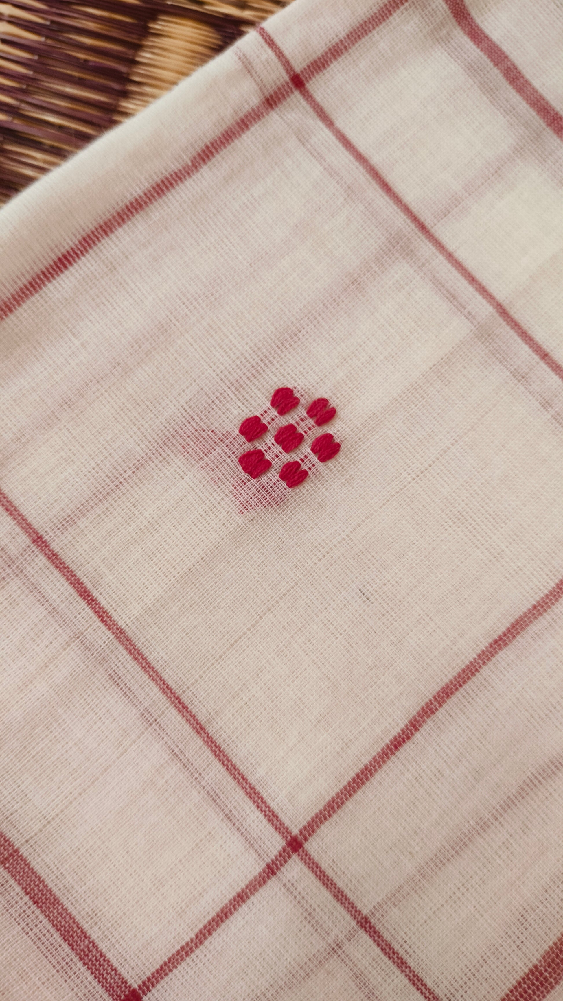Red and white handloom cotton saree with woven checks and motifs. Dhonekhali cotton from Bengal handloom. 