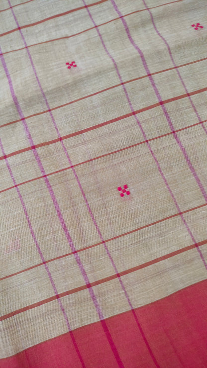Close-up of Beige and red Dhonekhali handloom cotton saree with woven red stripes and motifs throughout the saree. Bengal handloom cotton.