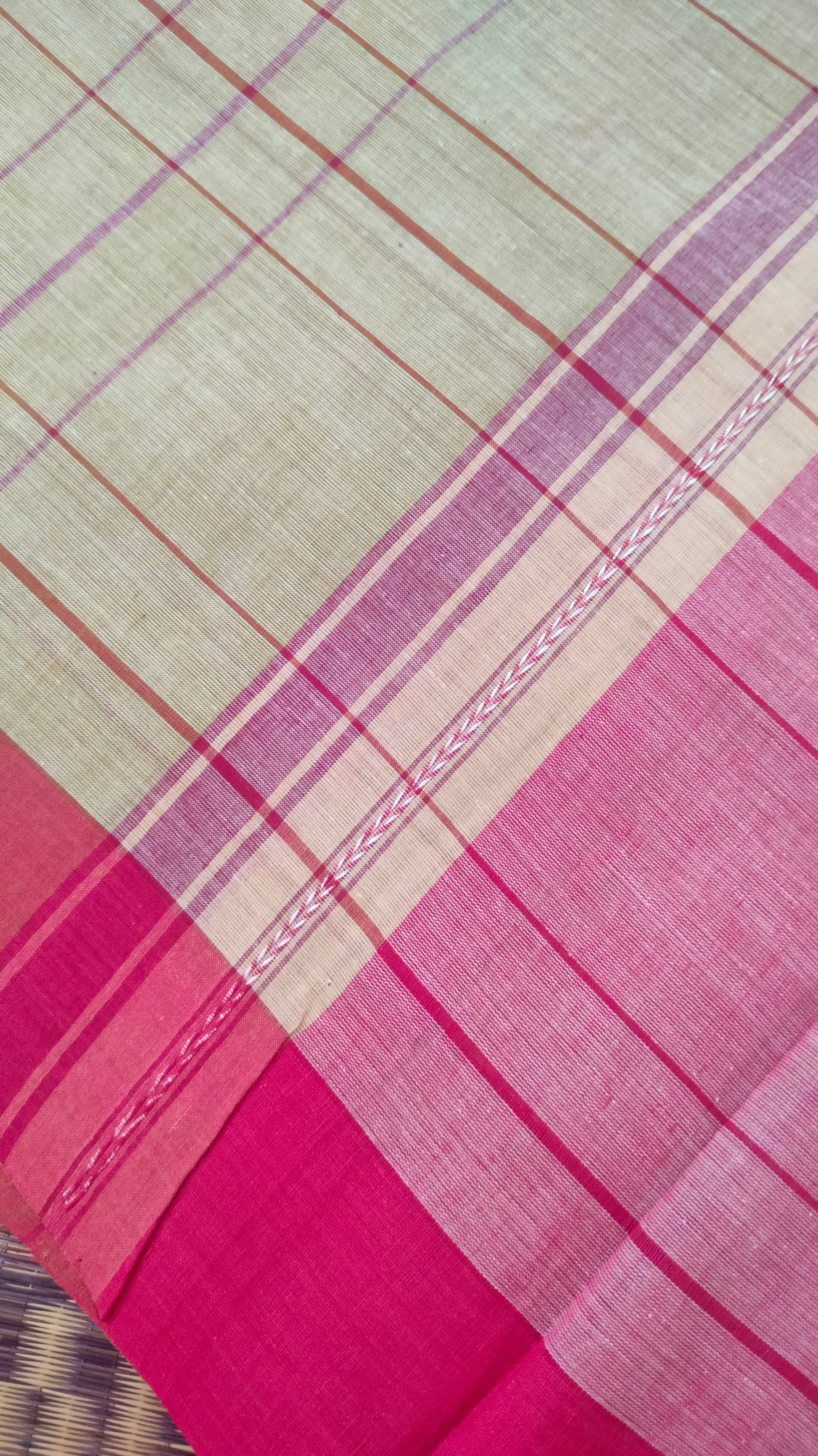 Beige and red Dhonekhali handloom cotton saree with woven red stripes and motifs throughout the saree. Bengal handloom cotton.