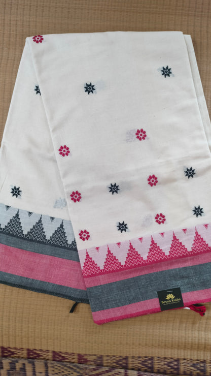 Dhonekhali handloom saree from Bengal, featuring a pristine white body adorned with red and black woven butis throughout. The dual borders—deep red at the lower edge and bold black at the upper edge—showcase intricate temple motifs, while the pallu ends with tassels. 