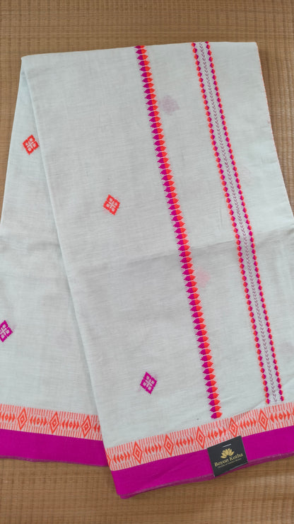 A white Dhonekhali handloom cotton saree with orange and pink woven motifs and bands on the saree. The border of the saree is pink with the inner edge having orange motifs.