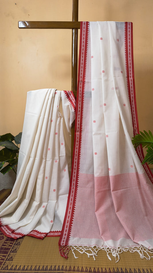 Handloom cotton saree in red and white with woven jamdani-inspired jacquard red butis and nakshi border. Perfect for festivals and cultural gatherings.