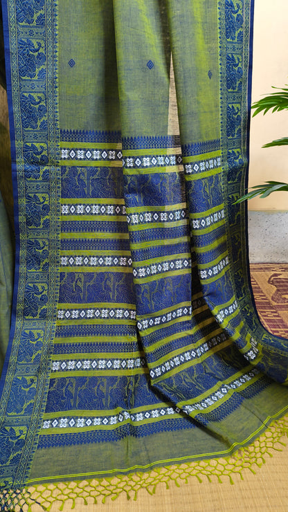 Dual toned green-blue cotton baluchari saree, with woven motifs in the border & pallu in navy blue. Bengal handloom ideal for festivals & everyday celebrations.