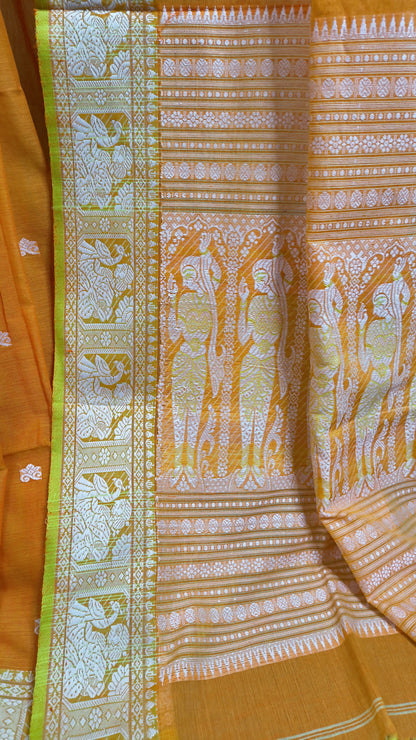 Orange cotton baluchari saree, with woven motifs in the border & pallu in white and neon green. Bengal handloom ideal for festivals & everyday celebrations.