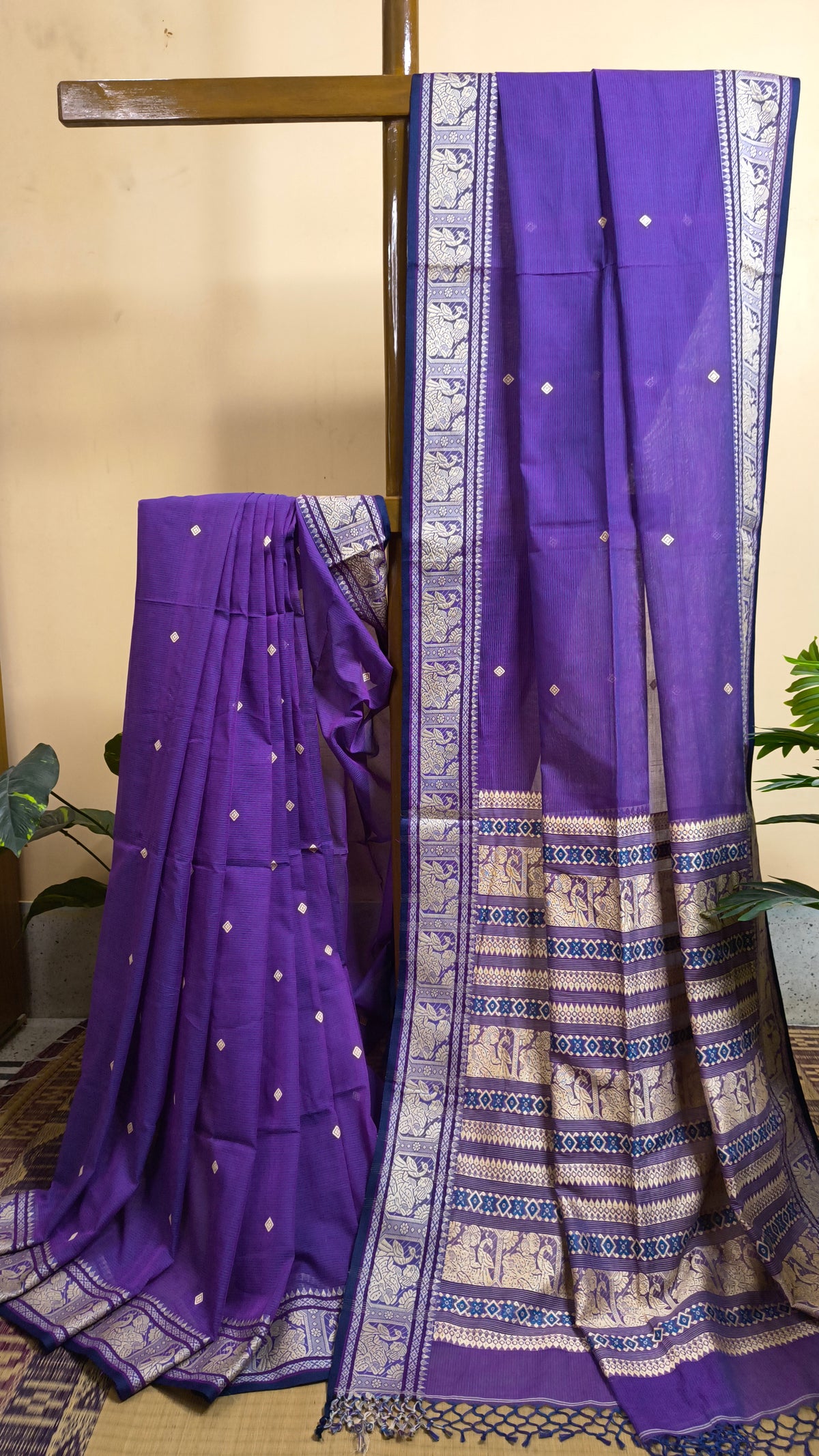 Purple cotton baluchari saree, with woven motifs in the border & pallu in beige. Bengal handloom ideal for festivals & everyday celebrations.